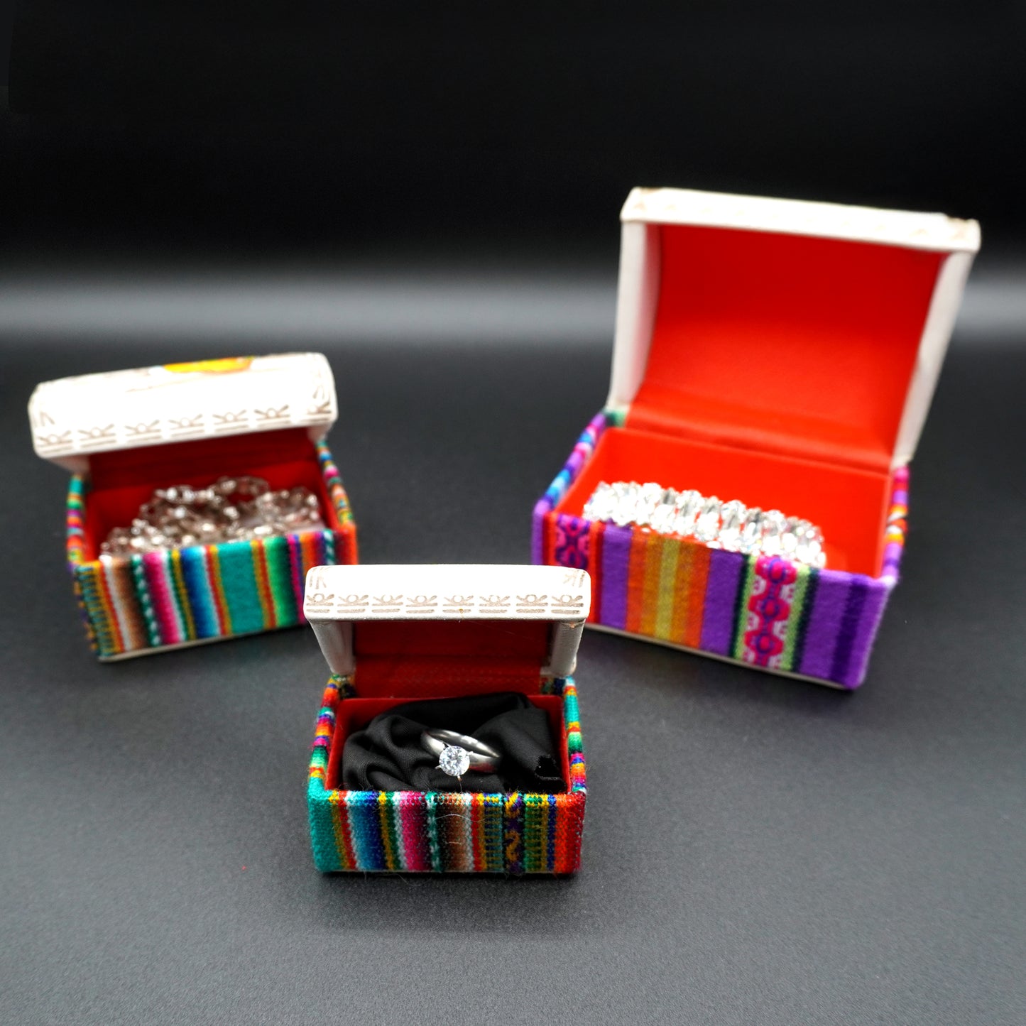 Set of 3 handcrafted nesting-style jewelry boxes in embossed, hand-painted leather