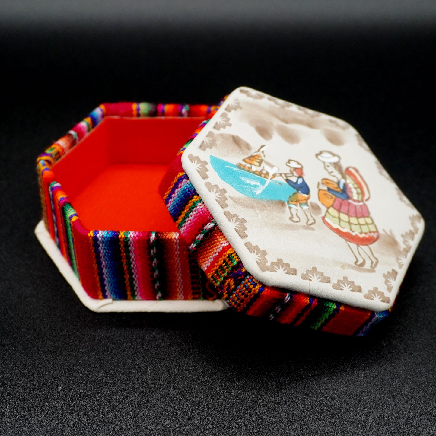 Hexagonal jewelry box made of embossed, hand-painted leather