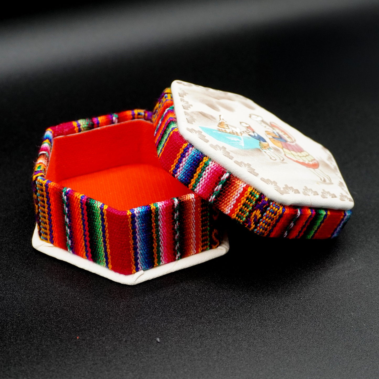 Hexagonal jewelry box made of embossed, hand-painted leather