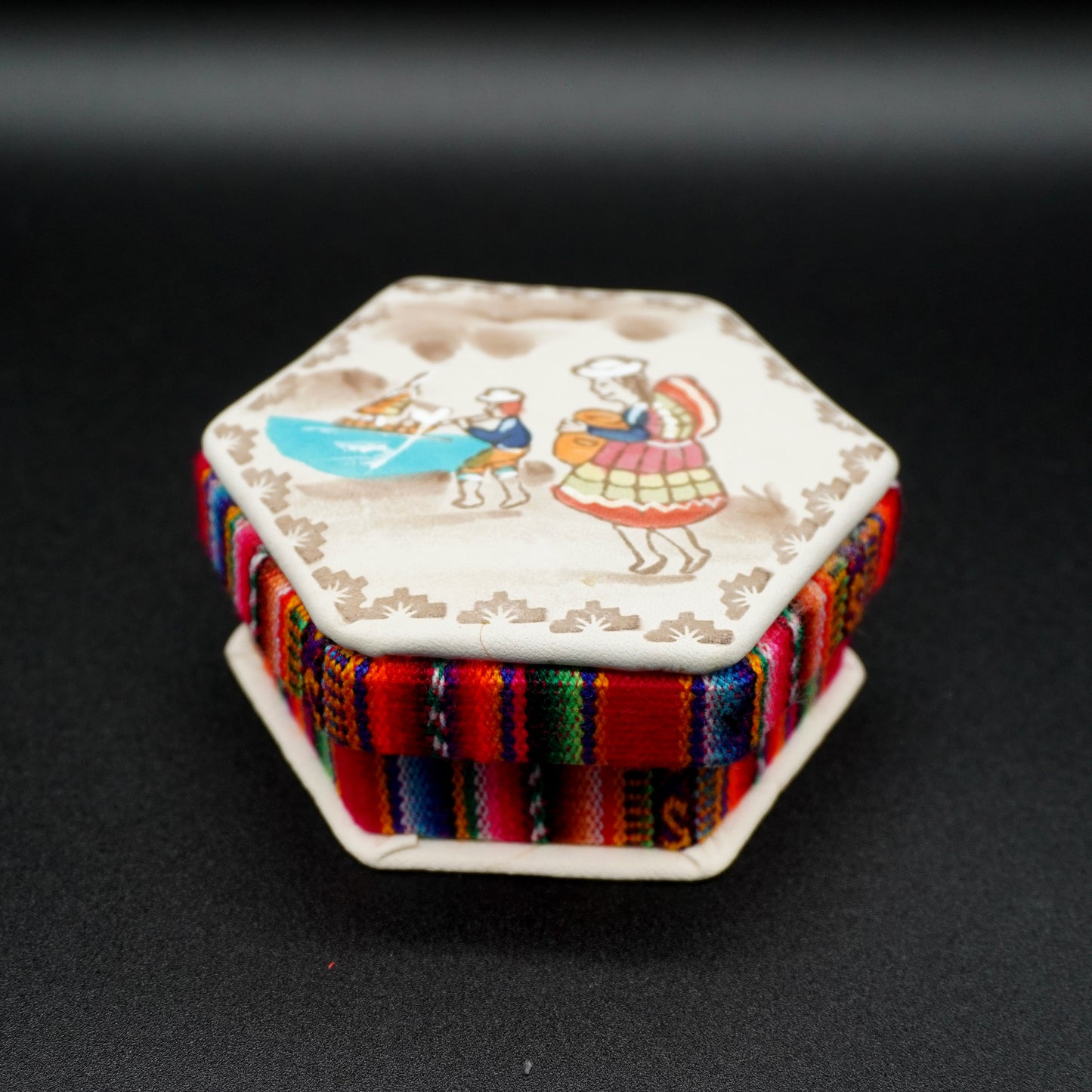 Hexagonal jewelry box made of embossed, hand-painted leather